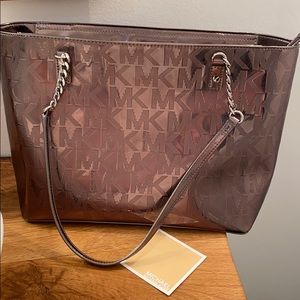 Michael Kors platinum vinyl handbag